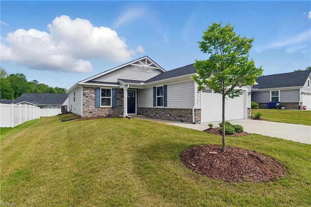6729 Nolan Run, Gloucester, VA 23061 - craftsman inspired home with driveway, a garage, and stone siding