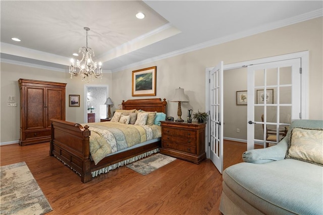 2968 Elegance Ln, Virginia Beach, VA 23456 - bedroom featuring a raised ceiling, wood finished floors, ornamental molding, french doors, and baseboards