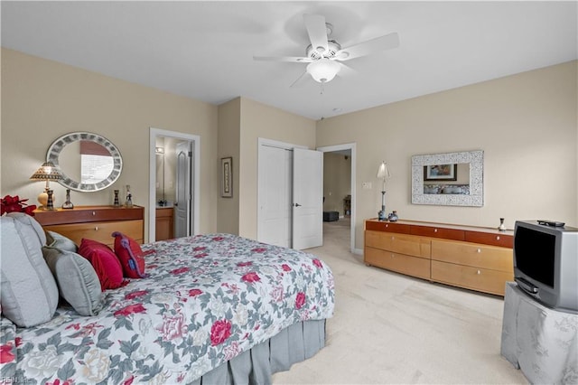 2968 Elegance Ln, Virginia Beach, VA 23456 - bedroom with light colored carpet, ensuite bath, and ceiling fan