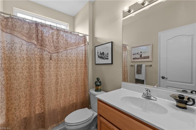 2968 Elegance Ln, Virginia Beach, VA 23456 - bathroom featuring toilet, vanity, and a shower with curtain