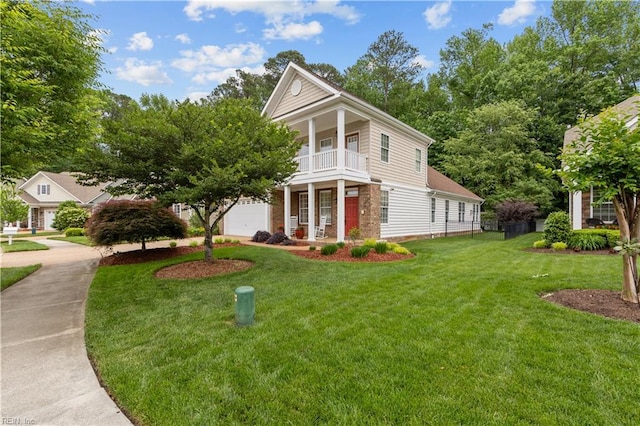 2968 Elegance Ln, Virginia Beach, VA 23456 - greek revival inspired property featuring a balcony, a front lawn, and a garage