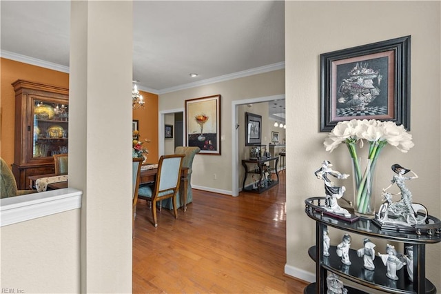 2968 Elegance Ln, Virginia Beach, VA 23456 - hallway featuring crown molding, wood finished floors, and baseboards