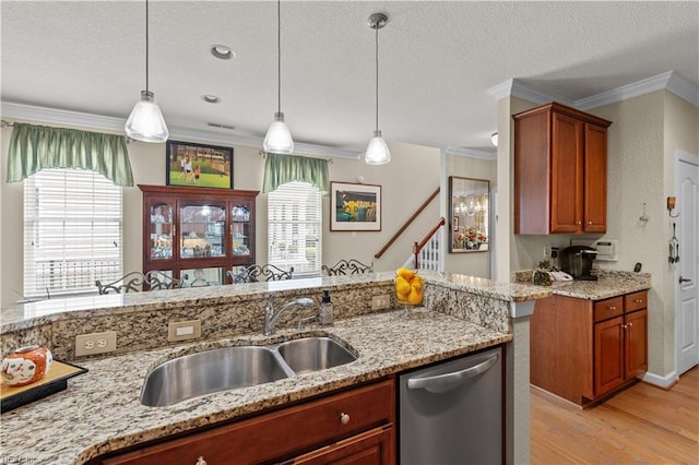 2968 Elegance Ln, Virginia Beach, VA 23456 - kitchen with stainless steel dishwasher, a sink, ornamental molding, light wood-style flooring, and brown cabinets