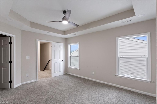 503 Middlesex St, Norfolk, VA 23523 - unfurnished bedroom featuring carpet floors, baseboards, and a tray ceiling