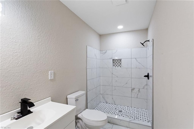 503 Middlesex St, Norfolk, VA 23523 - bathroom with a tile shower, toilet, vanity, and a textured wall