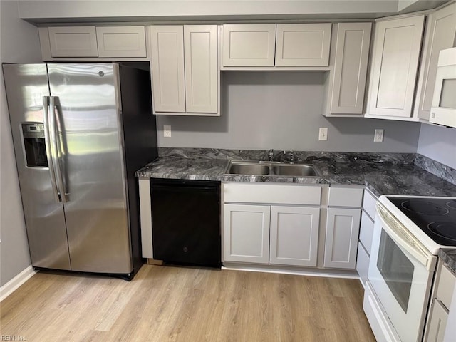 719 Tilden Pl, Virginia Beach, VA 23454 - kitchen with white appliances, a sink, and light wood-style flooring