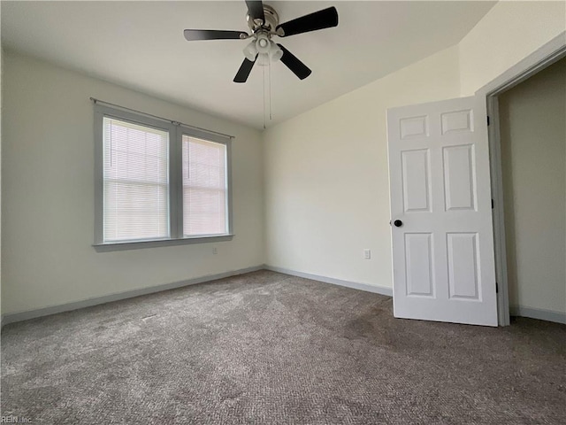 103 Lawrence Dr, Elizabeth City, NC 27909 - empty room featuring carpet flooring, ceiling fan, vaulted ceiling, and baseboards