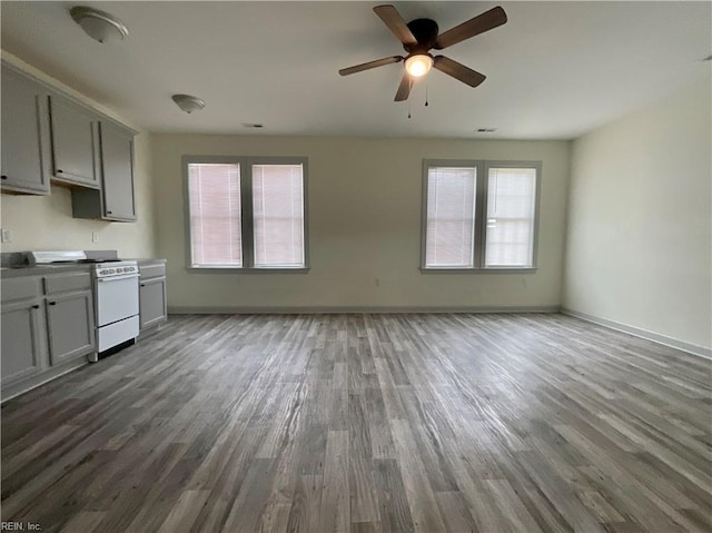 103 Lawrence Dr, Elizabeth City, NC 27909 - kitchen with white range with gas cooktop, wood finished floors, and healthy amount of natural light