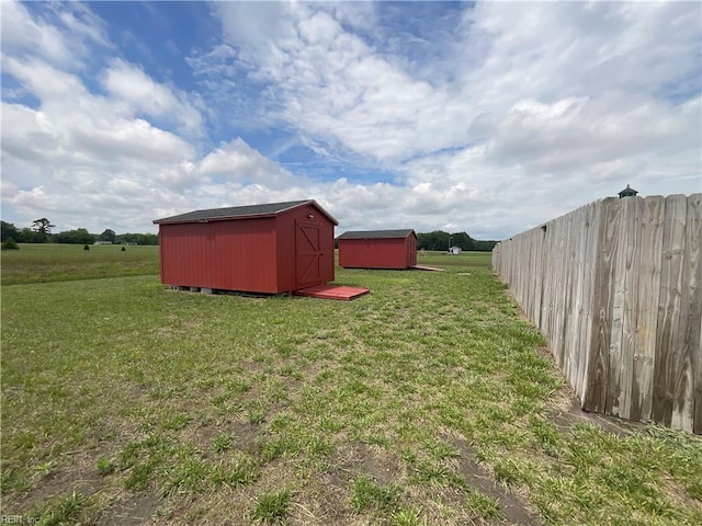 103 Lawrence Dr, Elizabeth City, NC 27909 - view of yard with a storage unit and an outbuilding