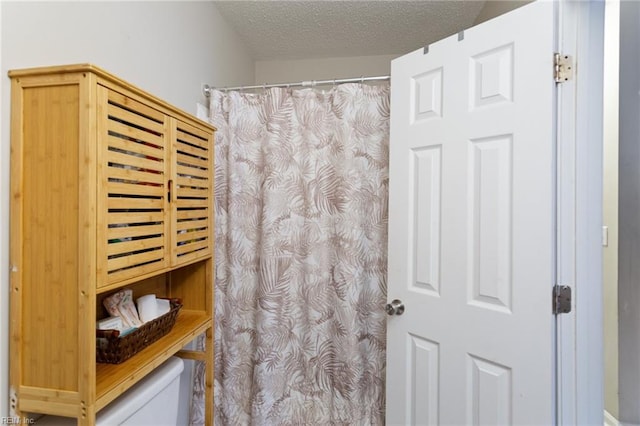 117 Bute St, Suffolk, VA 23434 - full bath featuring a textured ceiling and curtained shower
