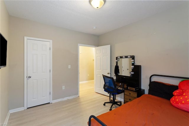 117 Bute St, Suffolk, VA 23434 - bedroom with light wood-style flooring and baseboards