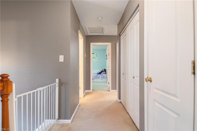 5049 Kelso St, Suffolk, VA 23435 - hall featuring light carpet, attic access, and baseboards