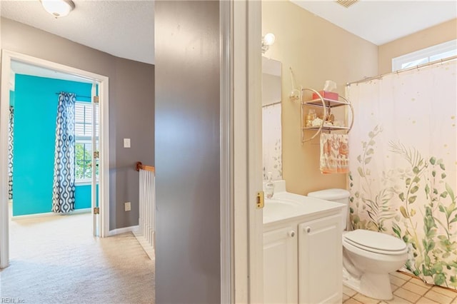 5049 Kelso St, Suffolk, VA 23435 - bathroom with toilet, vanity, a shower with curtain, and baseboards