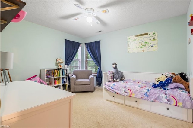 5049 Kelso St, Suffolk, VA 23435 - bedroom with carpet flooring, a textured ceiling, and a ceiling fan