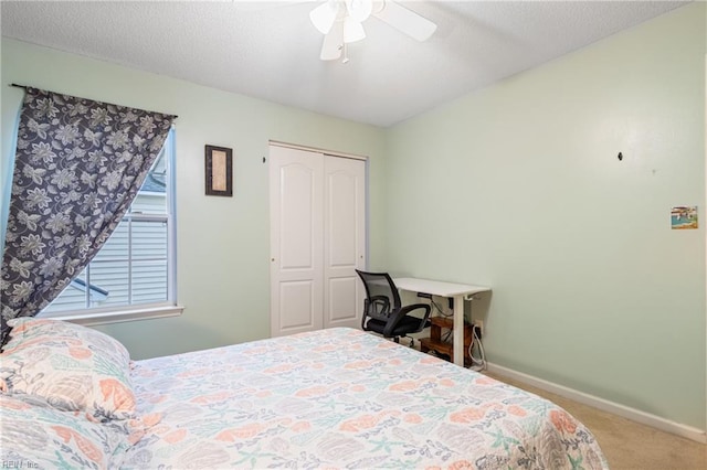 5049 Kelso St, Suffolk, VA 23435 - carpeted bedroom with a closet, baseboards, and a ceiling fan
