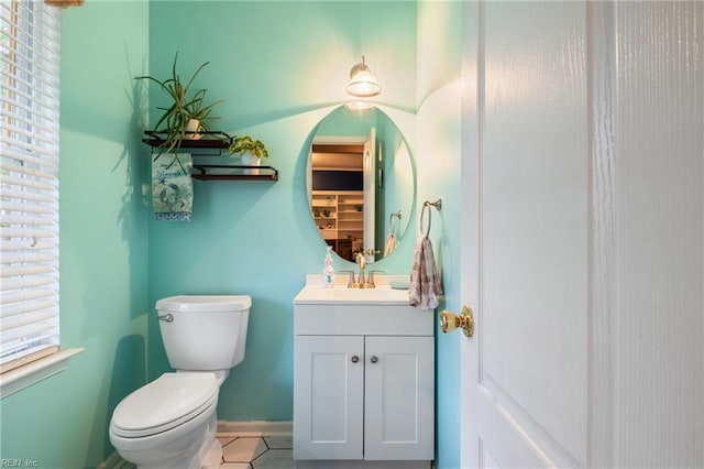5049 Kelso St, Suffolk, VA 23435 - half bath with tile patterned floors, toilet, and vanity