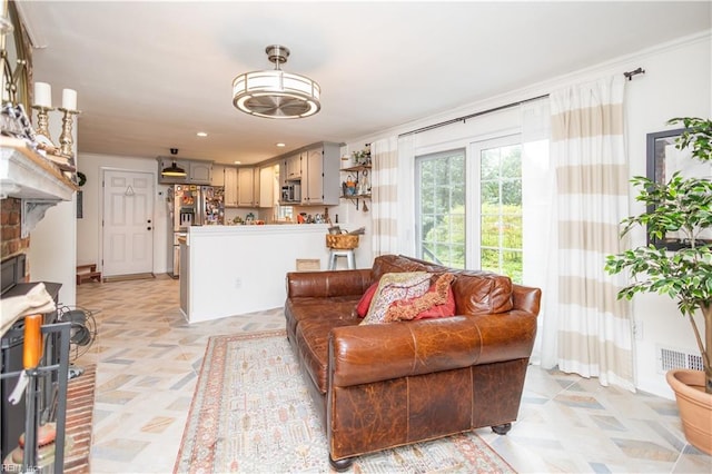 living area with light flooring, baseboards, and a fireplace