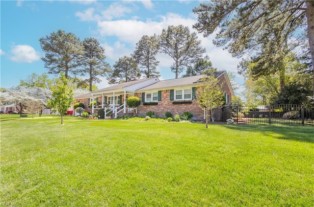 view of front of home featuring brick siding