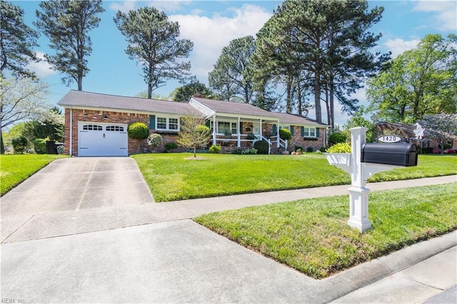 ranch-style home with a garage, a front lawn, driveway, a porch, and brick siding