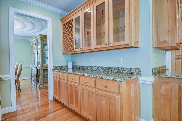 840 Forest Glade Dr, Chesapeake, VA 23322 - bar area with ornamental molding, light wood finished floors, and baseboards