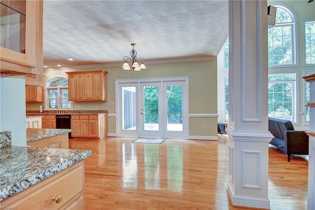 840 Forest Glade Dr, Chesapeake, VA 23322 - kitchen with black dishwasher, light brown cabinets, light wood-type flooring, a chandelier, and pendant lighting