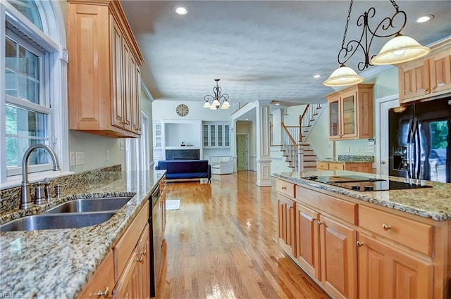 840 Forest Glade Dr, Chesapeake, VA 23322 - kitchen with black appliances, a sink, open floor plan, light stone countertops, and glass insert cabinets