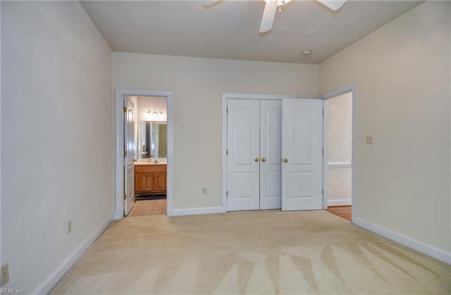 840 Forest Glade Dr, Chesapeake, VA 23322 - unfurnished bedroom featuring light carpet, baseboards, connected bathroom, a closet, and a ceiling fan