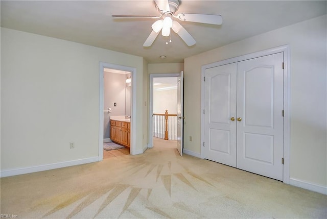 840 Forest Glade Dr, Chesapeake, VA 23322 - unfurnished bedroom with light colored carpet, baseboards, a closet, ensuite bath, and ceiling fan