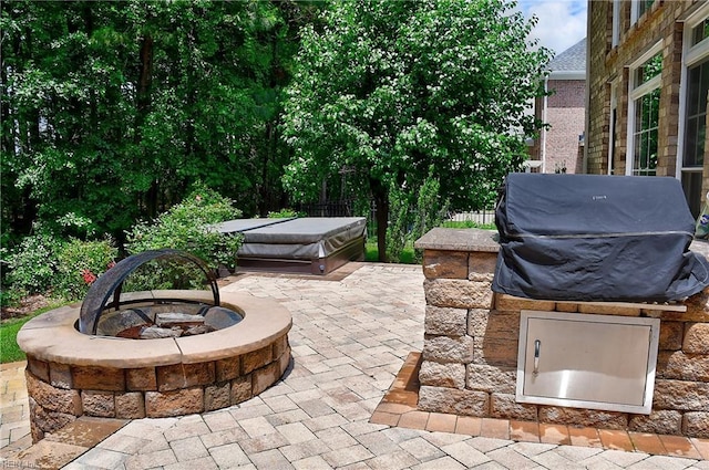 840 Forest Glade Dr, Chesapeake, VA 23322 - view of patio with an outdoor fire pit, a grill, and a covered hot tub
