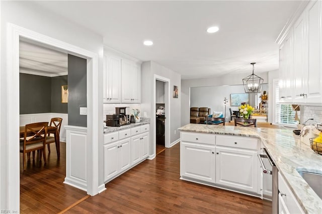 527 Lakeshead Dr, Williamsburg, VA 23185 - kitchen with white cabinets, a chandelier, a peninsula, backsplash, and recessed lighting