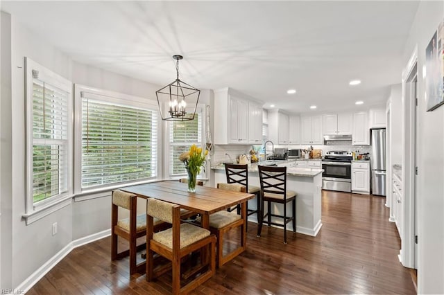 527 Lakeshead Dr, Williamsburg, VA 23185 - dining space with a chandelier, dark wood finished floors, baseboards, and recessed lighting