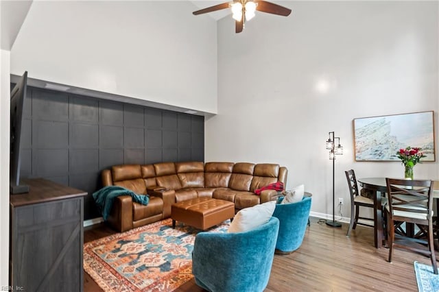 527 Lakeshead Dr, Williamsburg, VA 23185 - living area with a ceiling fan, wood finished floors, a high ceiling, and baseboards
