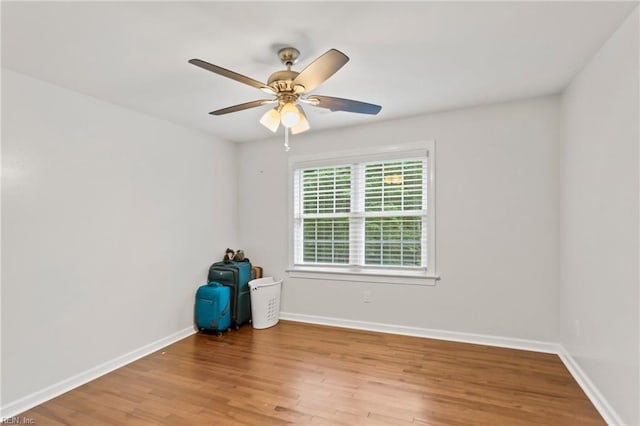 527 Lakeshead Dr, Williamsburg, VA 23185 - empty room with wood finished floors, a ceiling fan, and baseboards