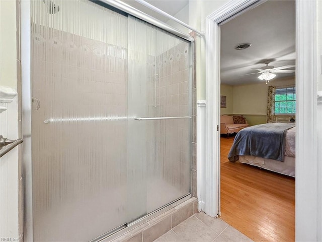 122 Archer Rd, Newport News, VA 23606 - ensuite bathroom featuring a shower stall, a ceiling fan, and wood finished floors