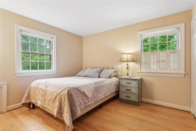 122 Archer Rd, Newport News, VA 23606 - bedroom featuring baseboards and wood finished floors