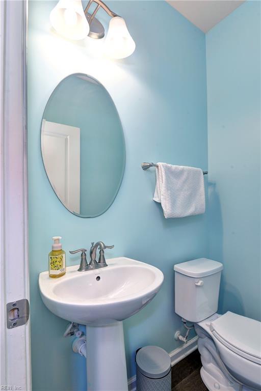 20 Pickins Dr, Poquoson, VA 23662 - half bath featuring toilet, wood finished floors, and baseboards