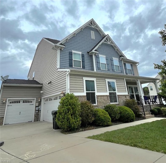 20 Pickins Dr, Poquoson, VA 23662 - craftsman inspired home with concrete driveway, a porch, and stone siding
