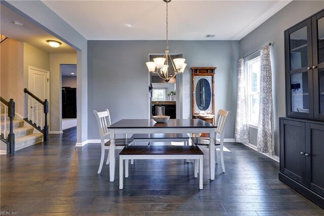 20 Pickins Dr, Poquoson, VA 23662 - dining room featuring baseboards, stairs, a chandelier, and dark wood finished floors