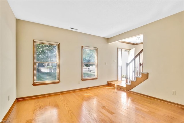 810 Erskine St, Hampton, VA 23666 - spare room with wood-type flooring, stairway, and baseboards