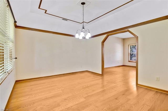 810 Erskine St, Hampton, VA 23666 - unfurnished room featuring wood finished floors, a chandelier, baseboards, arched walkways, and crown molding