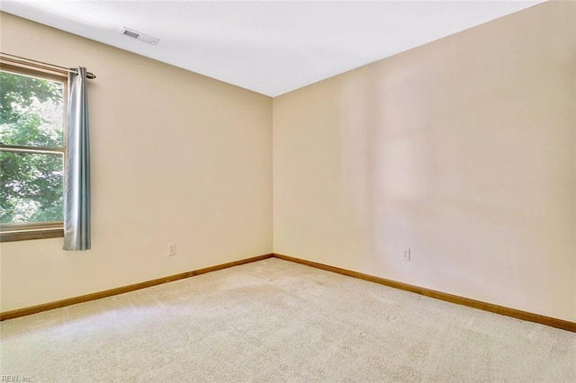 810 Erskine St, Hampton, VA 23666 - carpeted empty room with baseboards