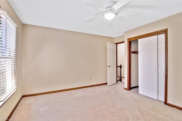 810 Erskine St, Hampton, VA 23666 - unfurnished bedroom featuring light colored carpet, baseboards, and multiple windows