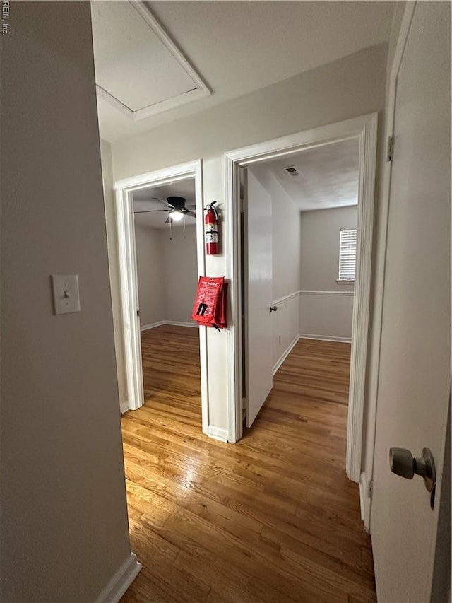 2800 Candlewood Cir, Chesapeake, VA 23324 - hallway featuring light wood-style flooring, baseboards, and attic access