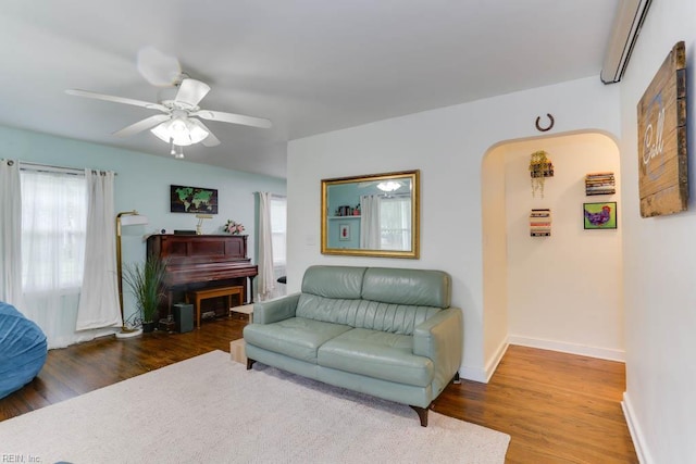 8140 Kenwood Dr, Norfolk, VA 23518 - living area with ceiling fan, wood finished floors, arched walkways, and baseboards