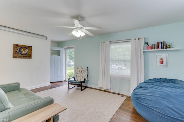 8140 Kenwood Dr, Norfolk, VA 23518 - living area with ceiling fan, wood finished floors, and baseboards