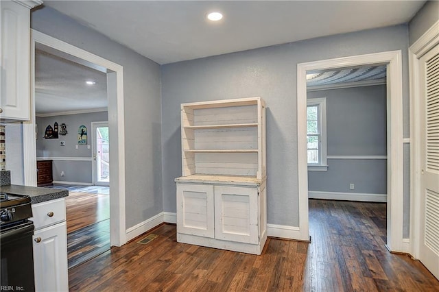 3582 Tennessee Ave, Norfolk, VA 23502 - kitchen with white cabinetry, dark wood-style flooring, recessed lighting, baseboards, and electric range