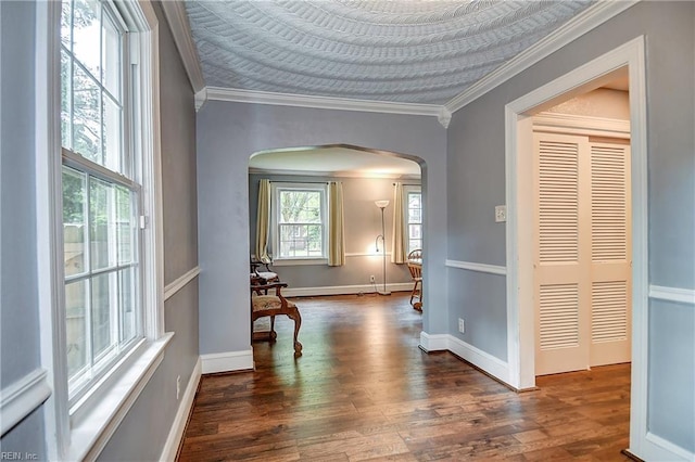3582 Tennessee Ave, Norfolk, VA 23502 - corridor with arched walkways, wood finished floors, crown molding, and baseboards