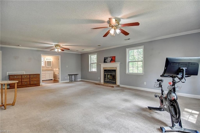 3582 Tennessee Ave, Norfolk, VA 23502 - exercise area with ceiling fan, a textured ceiling, ornamental molding, a glass covered fireplace, and baseboards