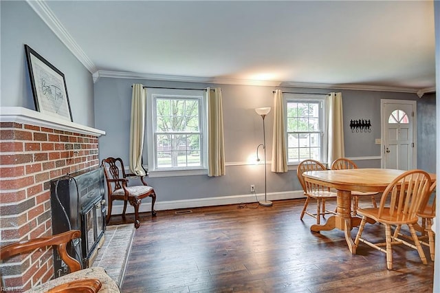 3582 Tennessee Ave, Norfolk, VA 23502 - dining area featuring wood finished floors, crown molding, baseboards, and a fireplace