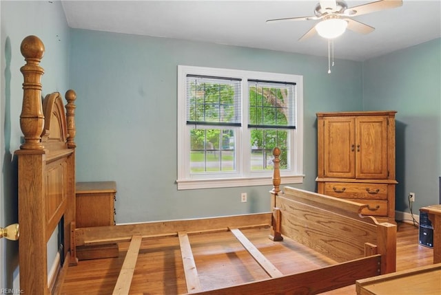 116 Sycamore Rd, Franklin, VA 23851 - bedroom with light wood-style flooring, multiple windows, baseboards, and ceiling fan